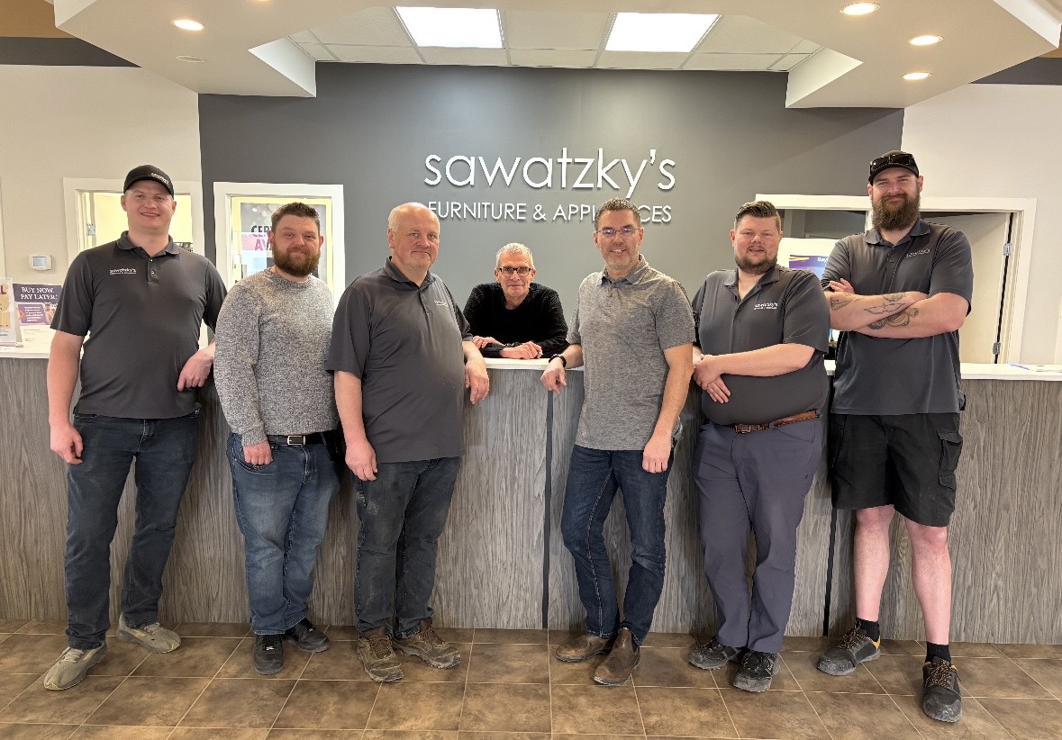 Sawatzky’s team members in the showroom