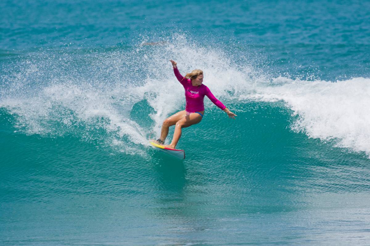 Woman surfing down south