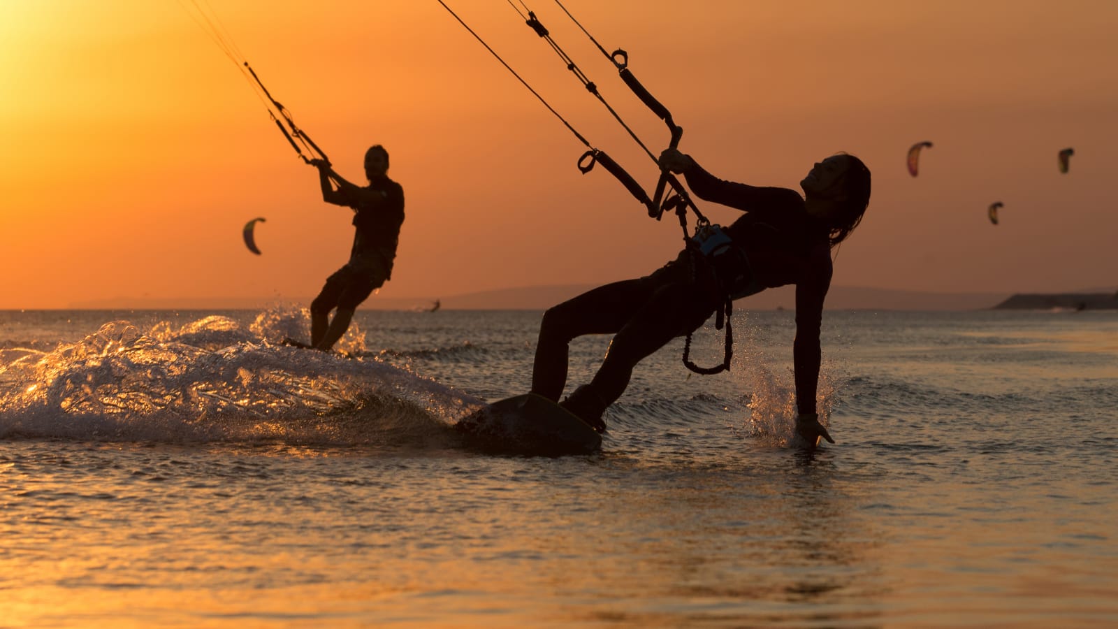Kitesurfers and calm lagoon