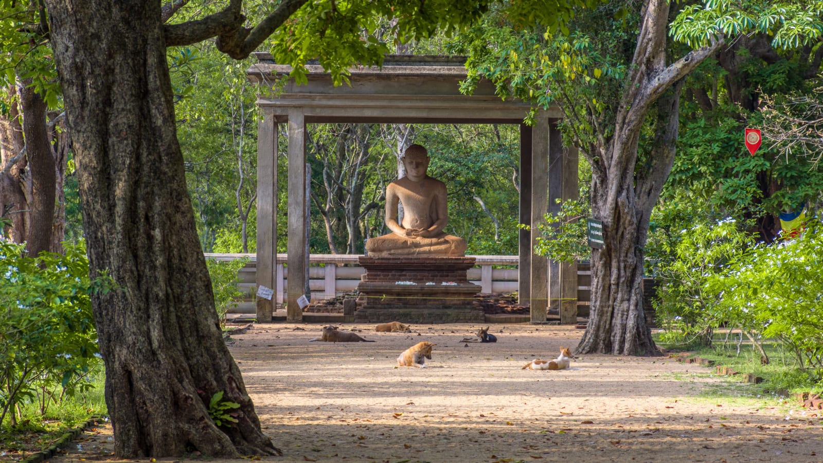 Stone statue of a meditating Buddha