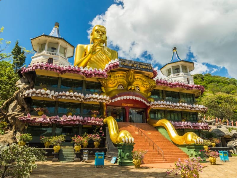 Temple entrance with golden statue