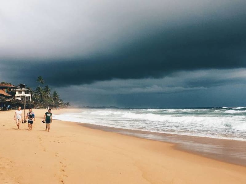 Hikkaduwa beach with oncoming rain
