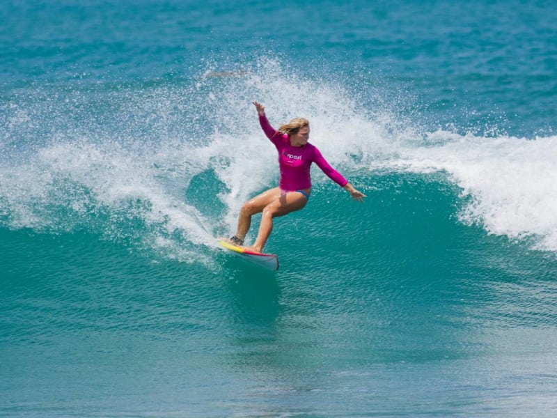 Woman surfing down south