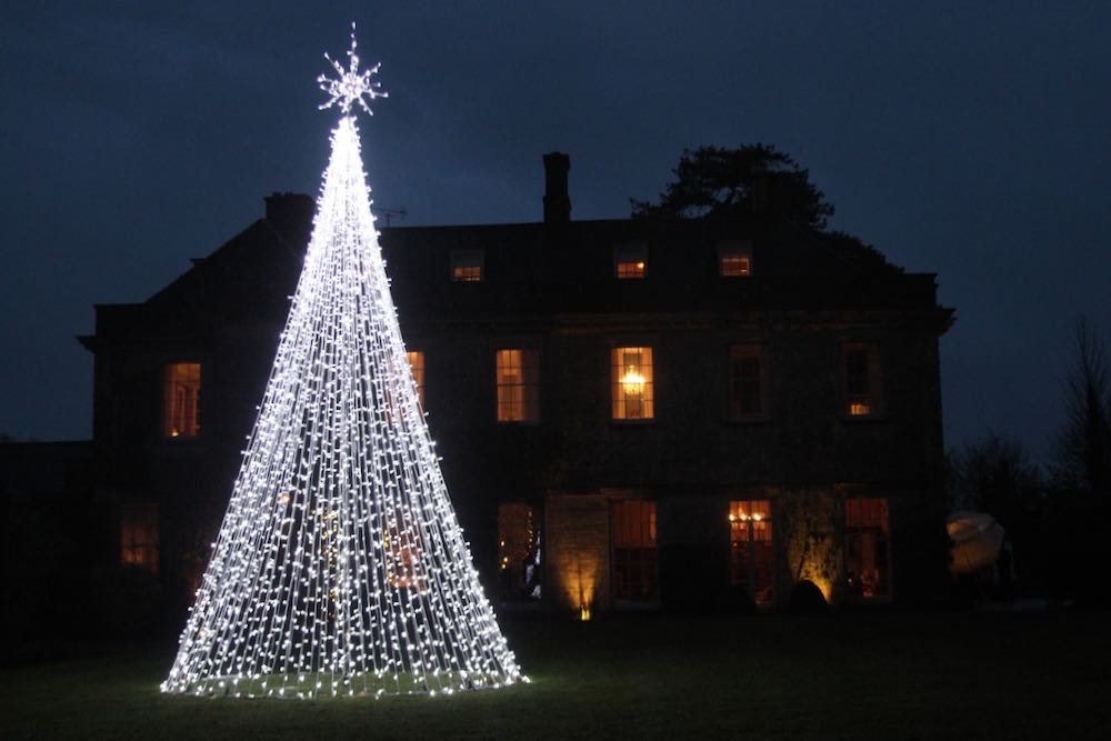 Festive Christmas celebration with professional party lighting and elegant venue styling