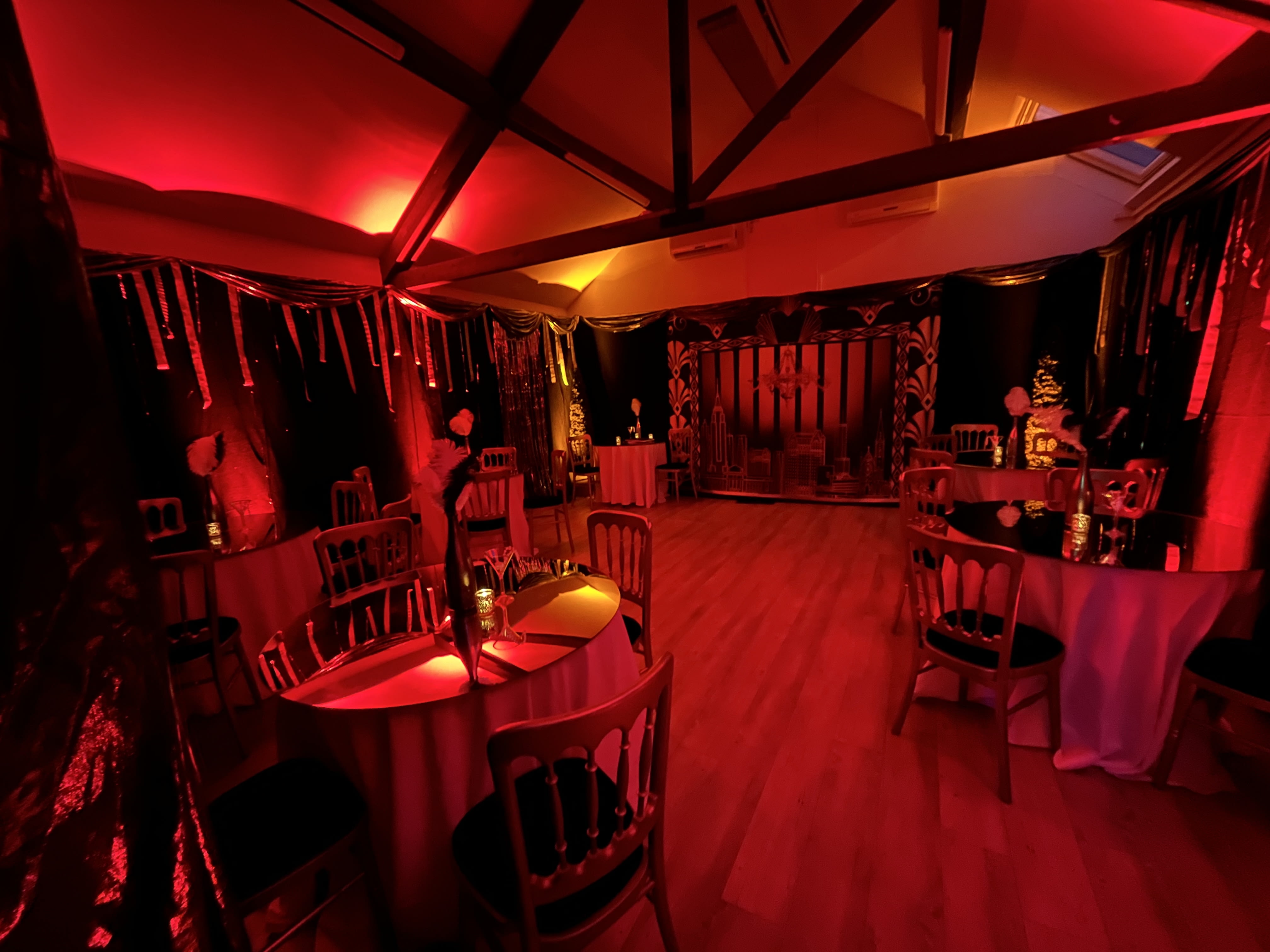 Professional lighting design transformation creating a stunning venue atmosphere with elegant lighting effects