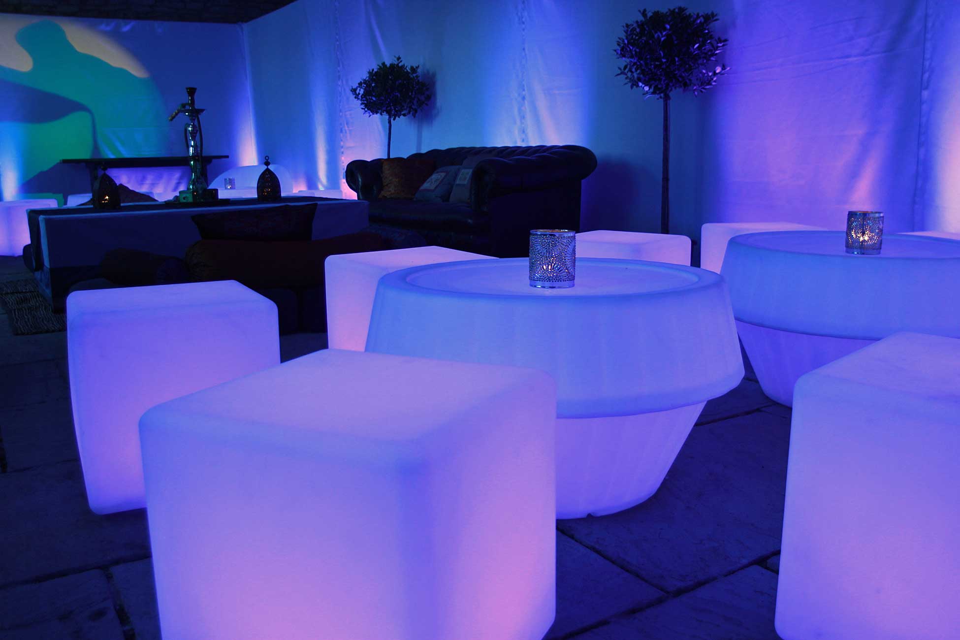 LED furniture and creative venue styling with modern lighting design creating a unique party atmosphere