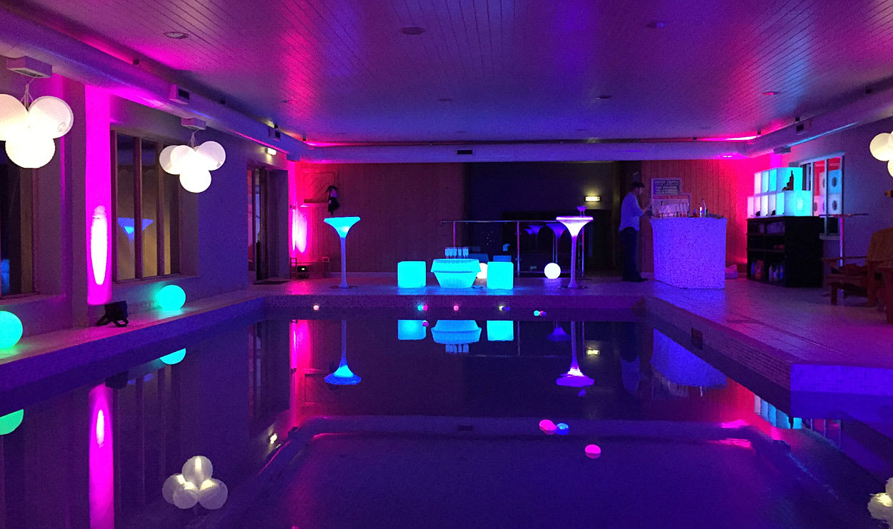 Pool party with professional venue styling, creative decorations, and beautiful lighting design