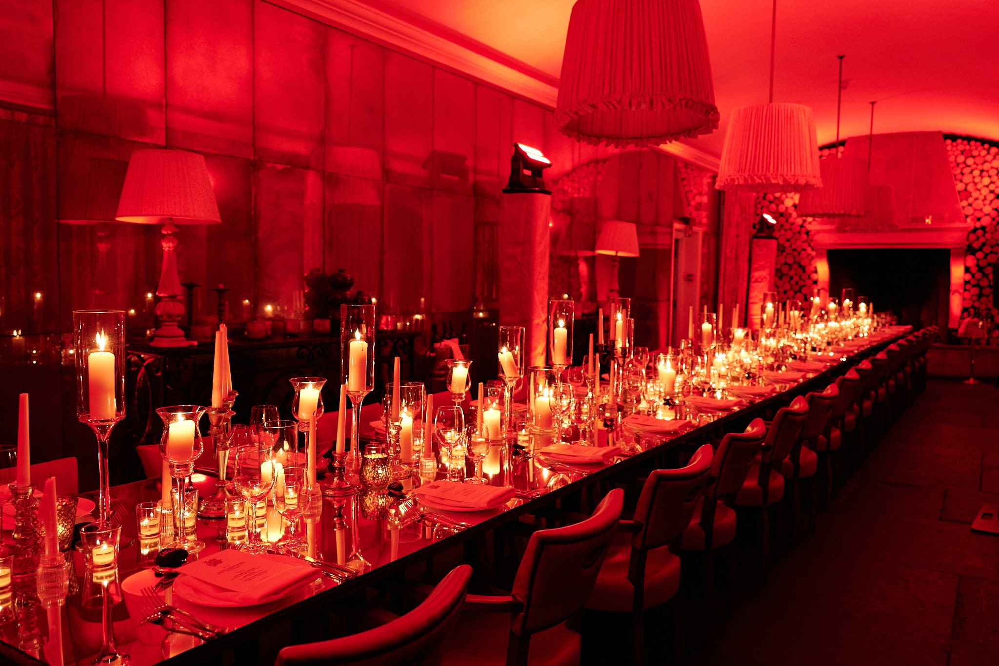 Sophisticated wedding venue styling with professional lighting design and elegant atmosphere