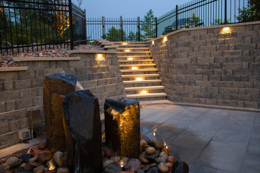 Project 1: retaining wall along travertine patio