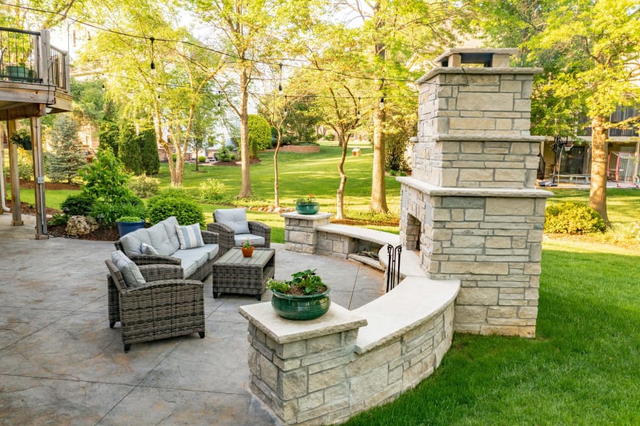 Seating wall integrated with a patio