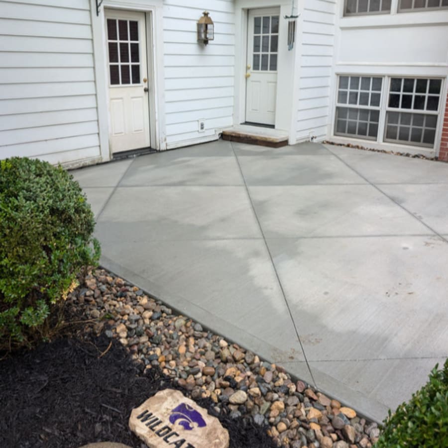 Diamond Cut Concrete vs. Pavers Over a Concrete Slab