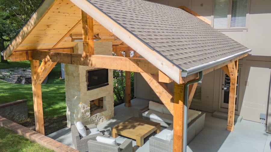 Aerial drone view of an outdoor living build with pavilion and paver patio by Kansas City Hardscapes