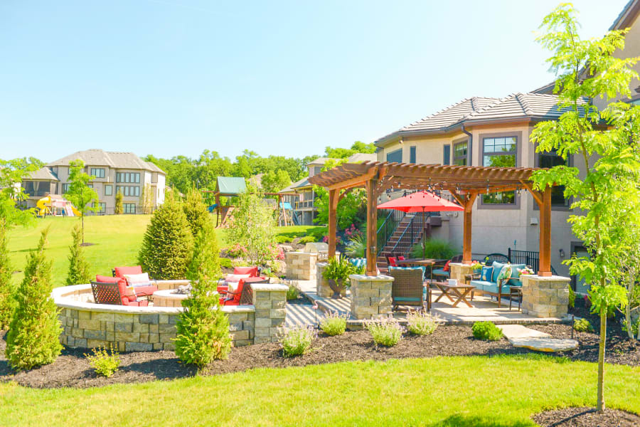 Blue Springs, Missouri outdoor living build with pergola, paver patio, and grill station by Kansas City Hardscapes