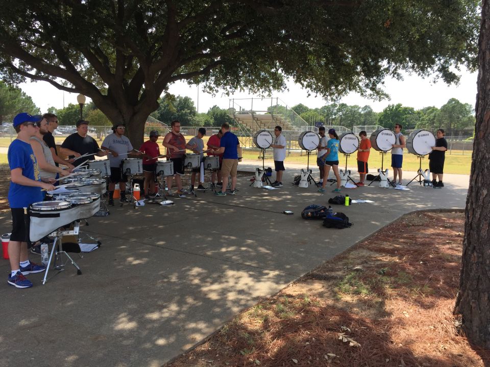 Michael helping teach the University of Texas at Arlington drum line in August 2015