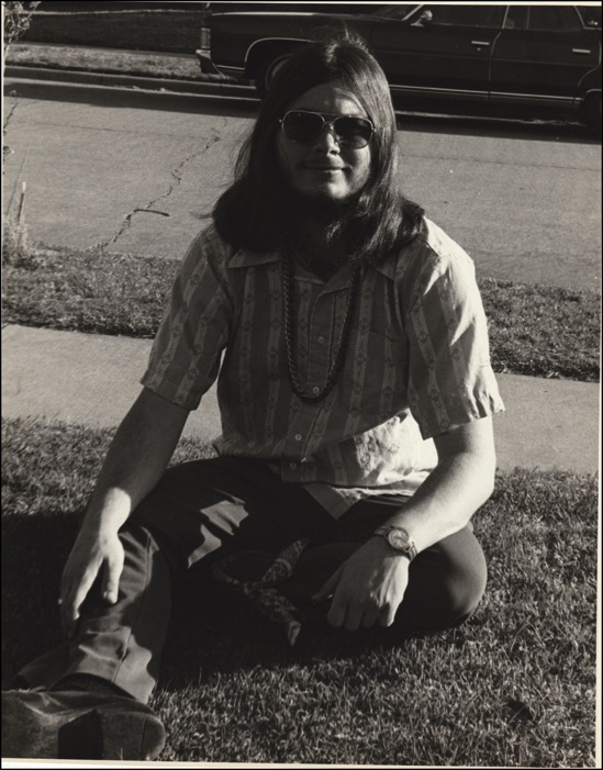 Mark-sitting-in-grass