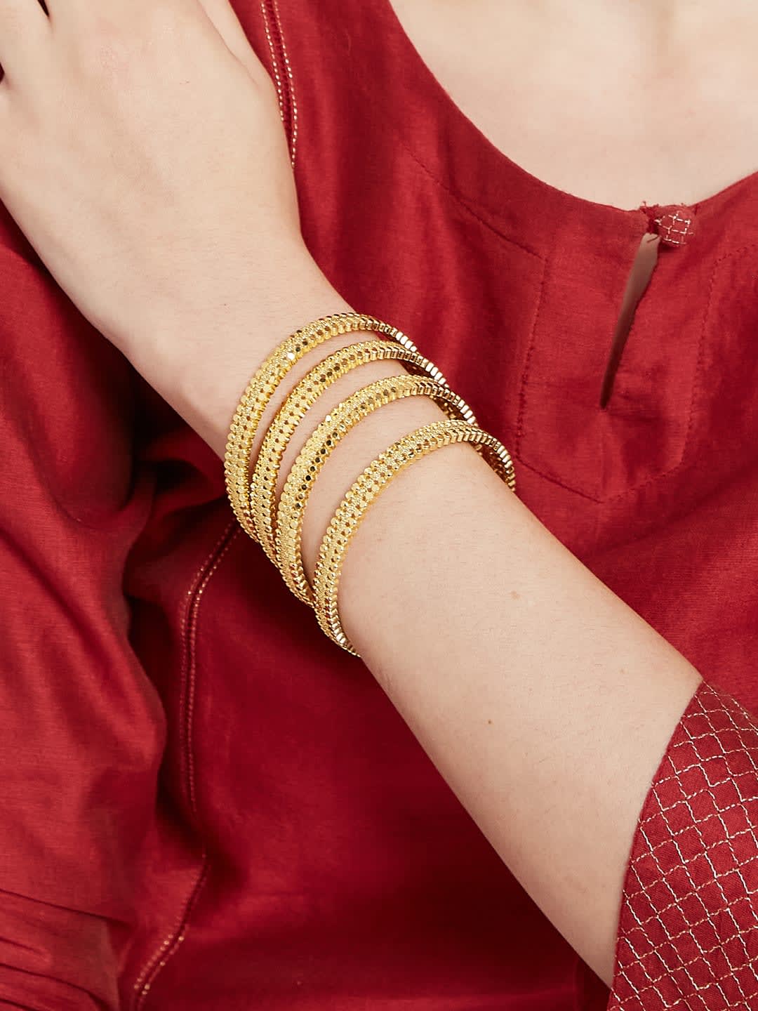 ATIBELLE Set Of 4 Gold-Plated Floral Shaped Textured Bangles