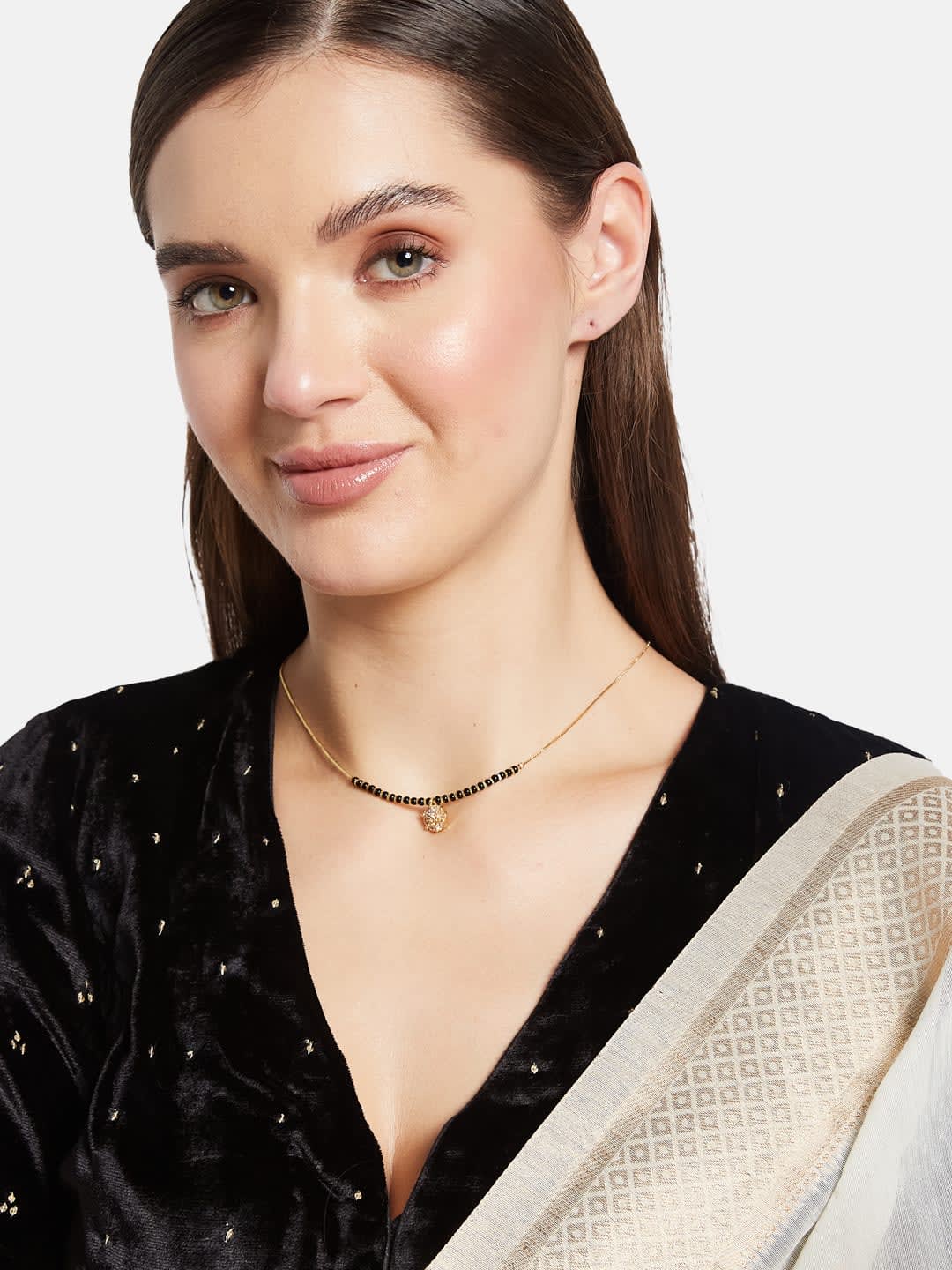 ATIBELLE Gold-Plated Cubic Zirconia Stone Studded & Beaded Floral Shaped Mangalsutra