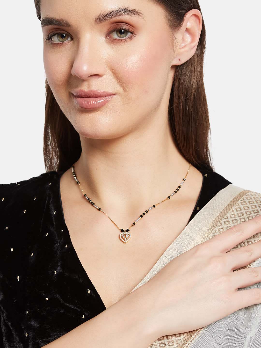 ATIBELLE Gold-Plated Cubic Zirconia Stone Studded & Beaded Heart Shaped Mangalsutra
