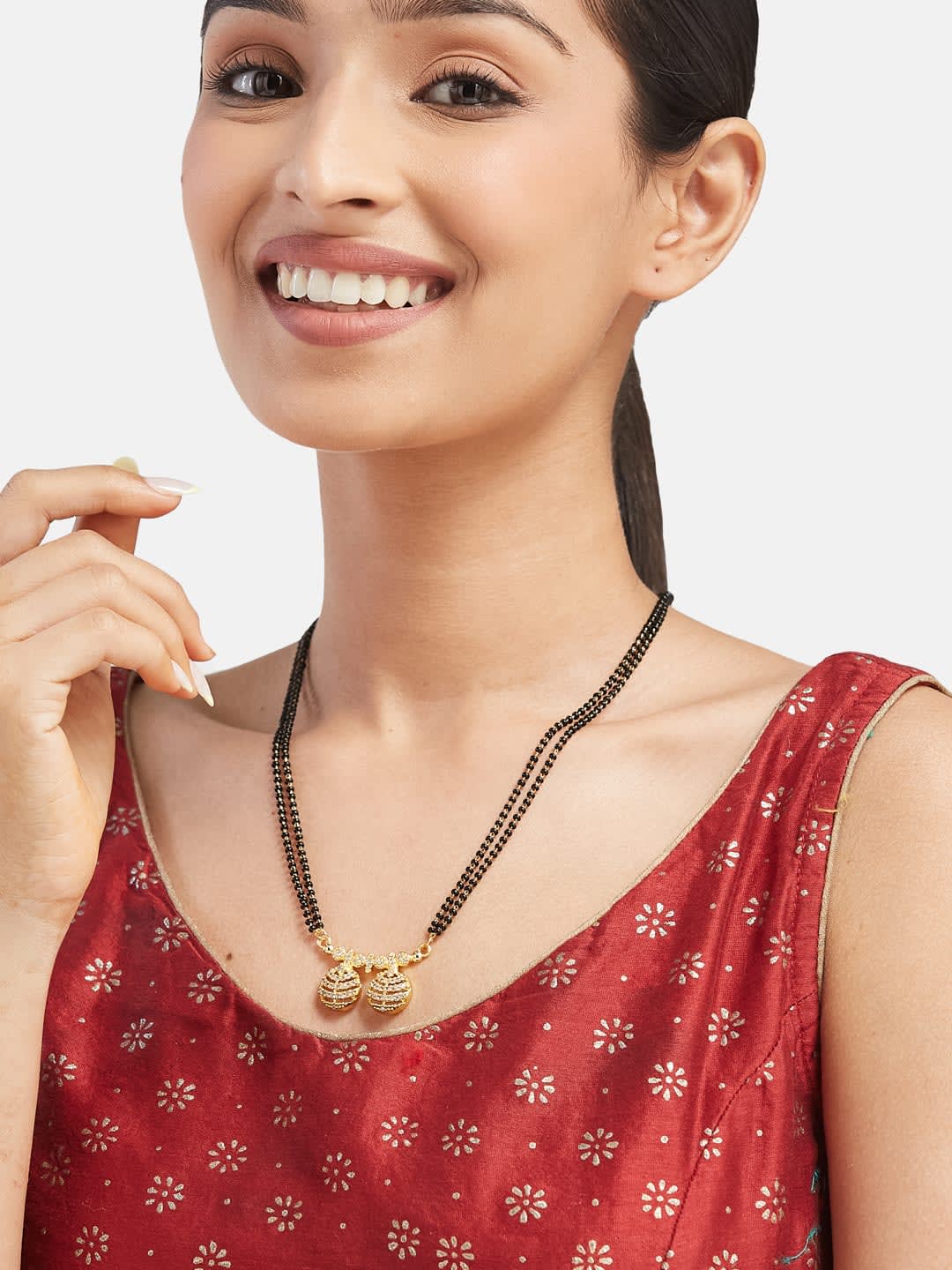 ATIBELLE Gold-Plated Artificial Stones Studded and Beaded Mangalsutra
