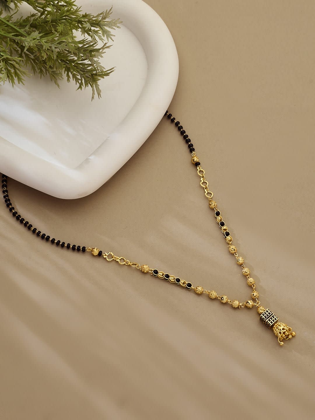 ATIBELLE Gold-Plated Artificial Stones Studded And Beads Mangalsutra