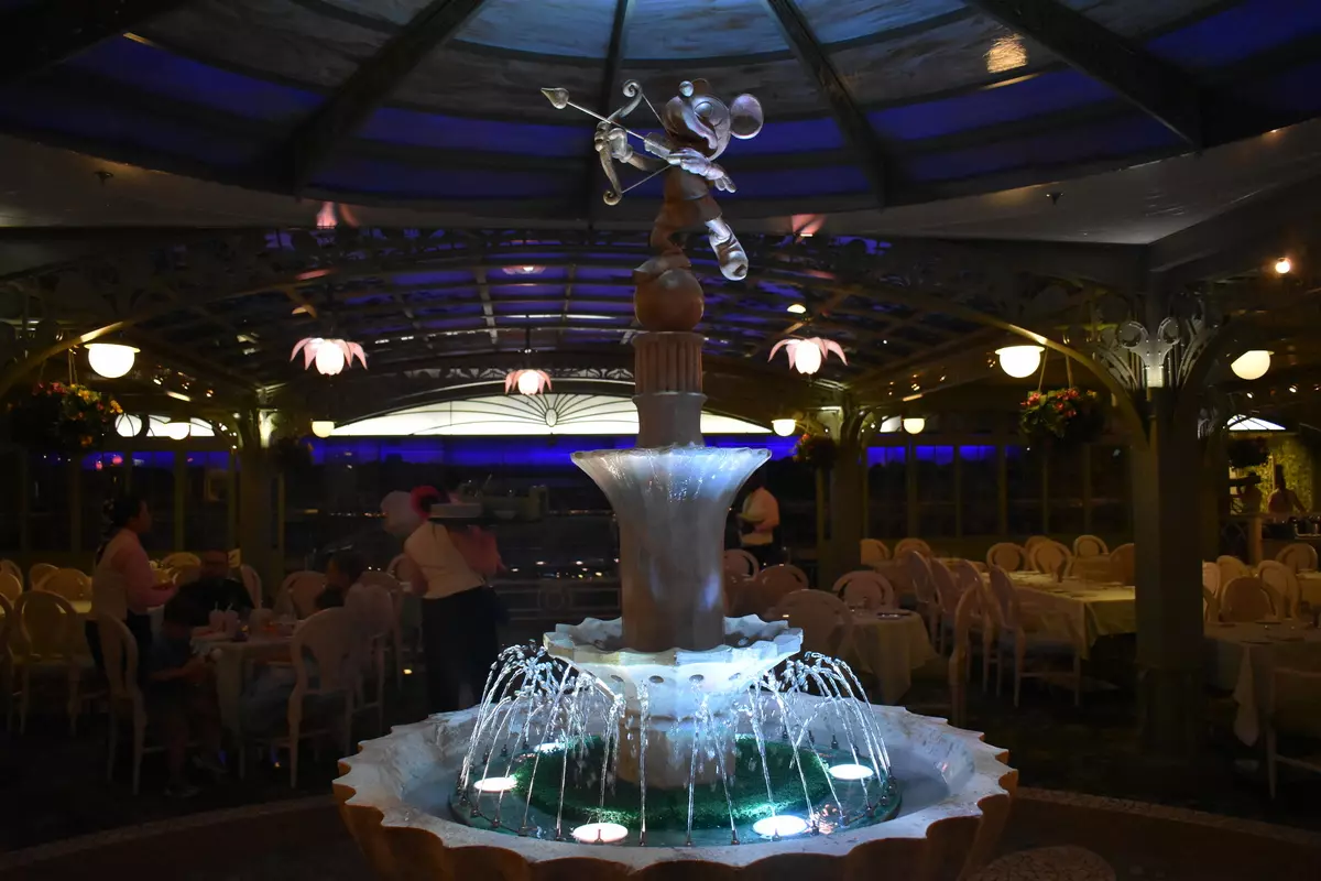 Disney Cruise Enchanted Garden mickey statue.webp