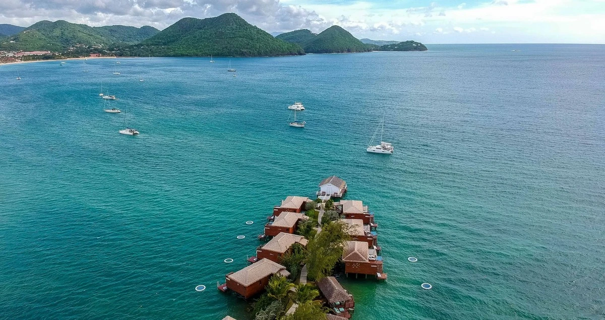 Sandals Grande St Lucian overwater bungalows.webp