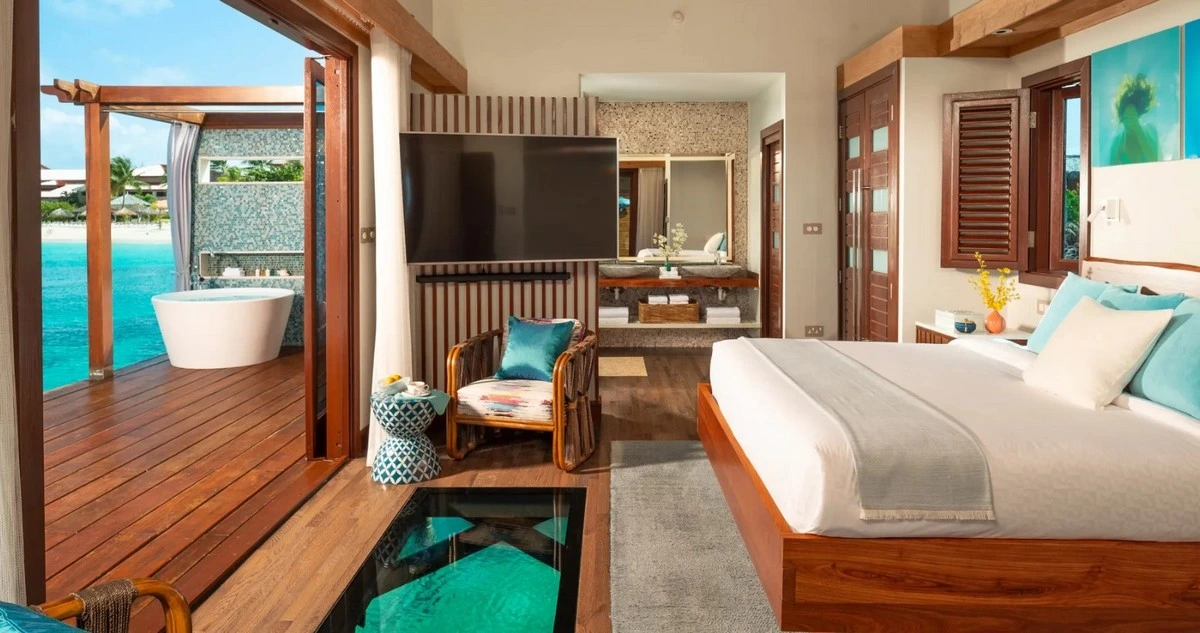 Sandals Grande St Lucian overwater bungalow room.webp