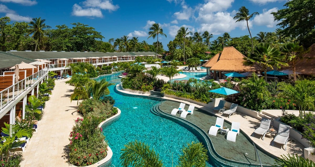 Sandals Halcyon Beach longest caribbean pool.webp