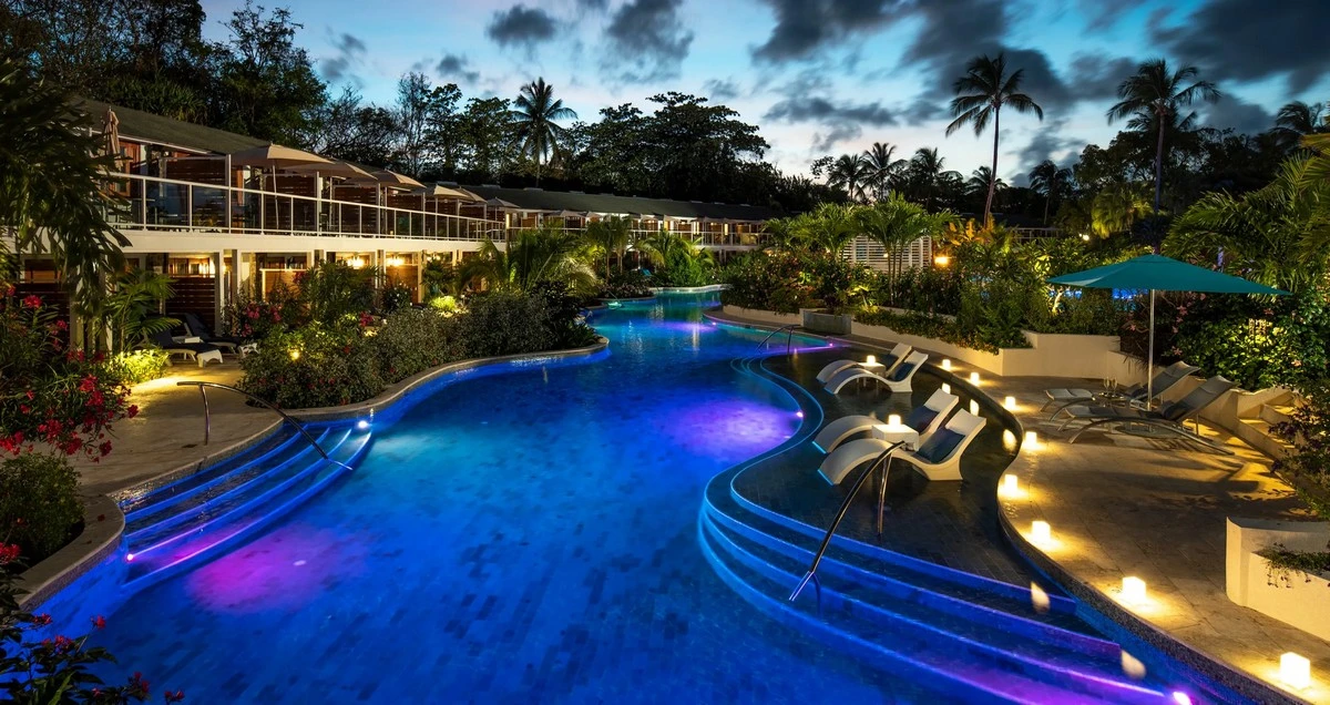 Sandals Halcyon Beach pool night.webp