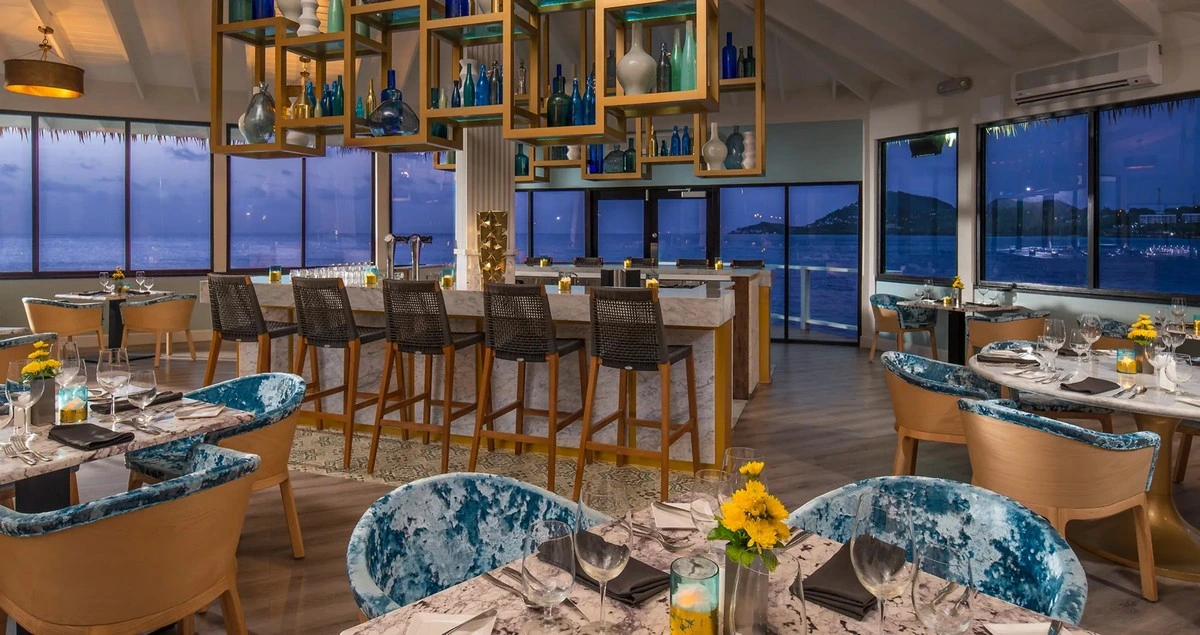 Sandals Halcyon Beach Kellys Dockside tables.webp