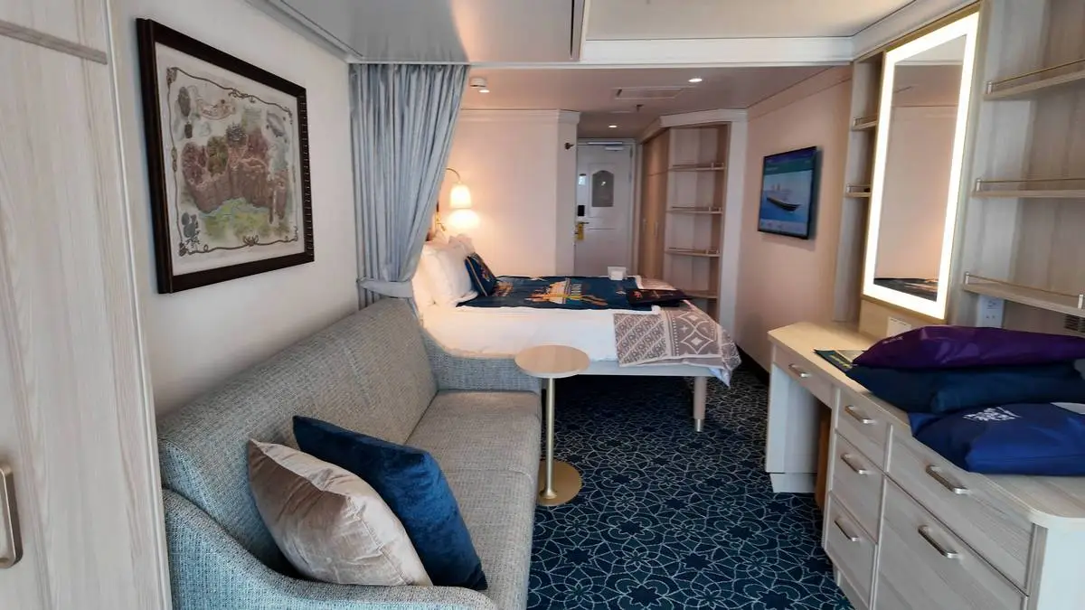 Disney-Treasure-Stateroom-full-view.webp