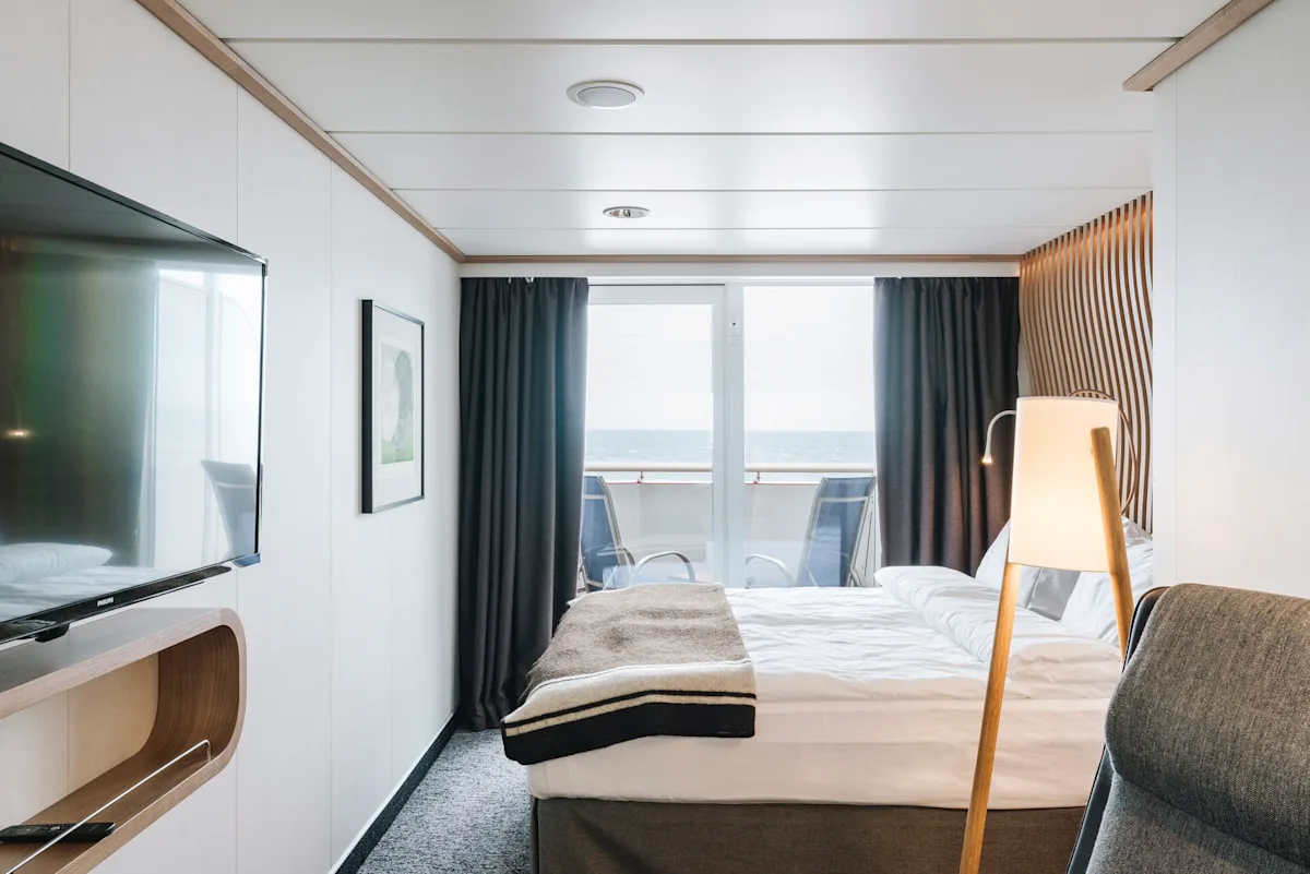 HX Hurtigruten Expeditions Arctic Superior Cabin.webp