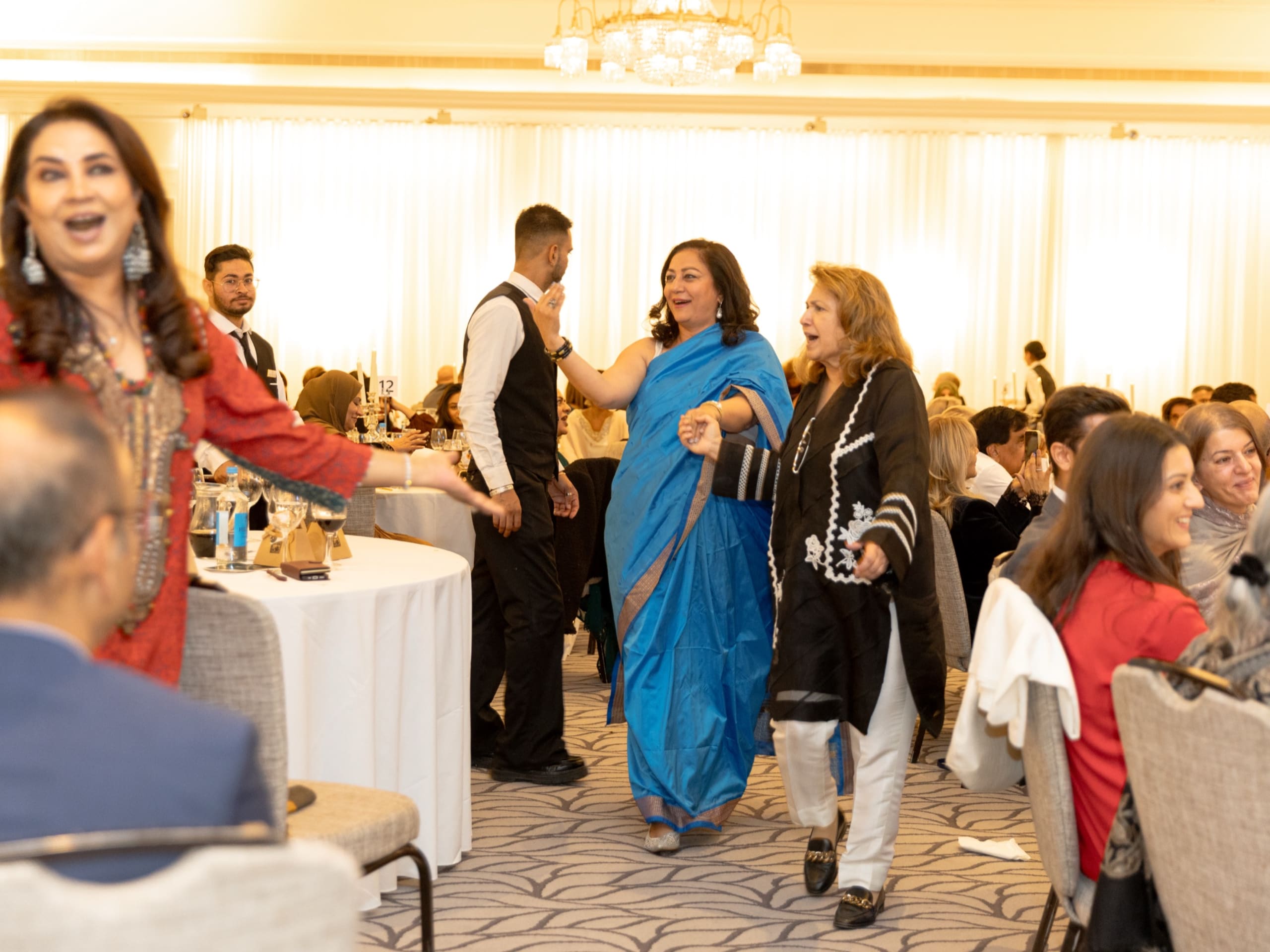 Guests celebrating as the evening goes on
