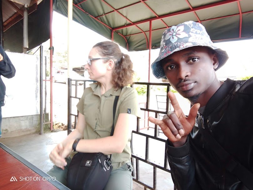 Travelers exploring waterfalls, coffee farms, and Mount Kilimanjaro landscapes near Moshi, Tanzania