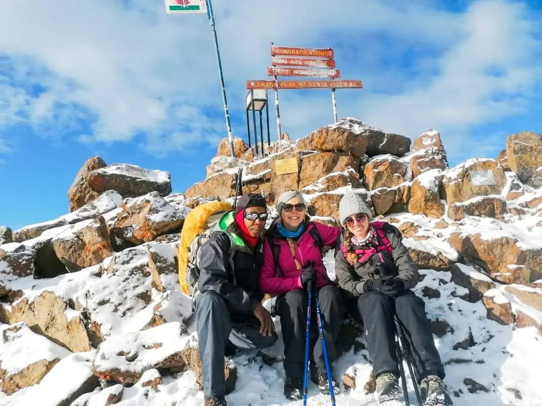 Snow-capped peaks of Mount Kenya with dramatic alpine landscape at sunrise