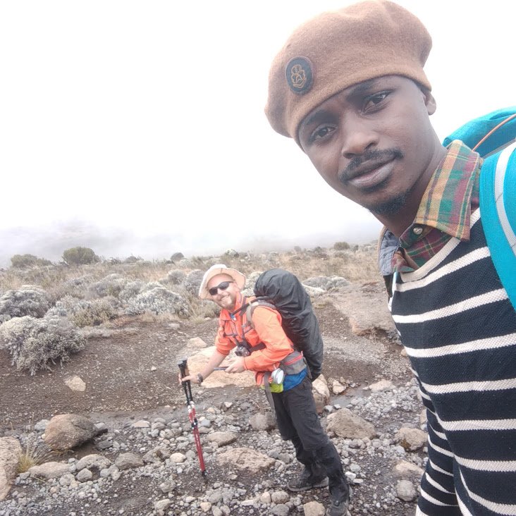 Climbers on Machame route with diverse landscapes