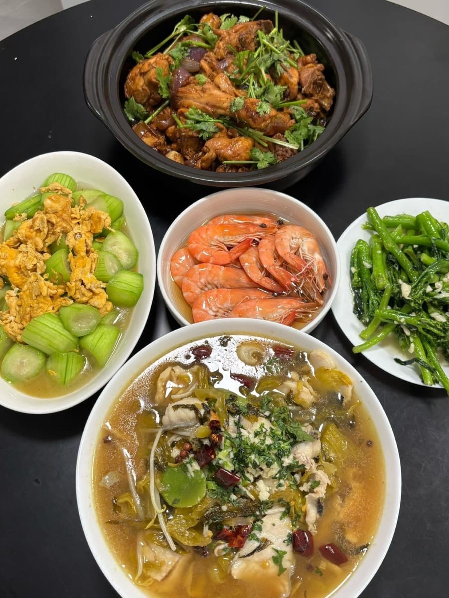A home-cooked table at Chuan's home