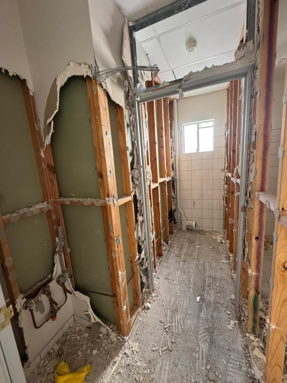 Bathroom Gutted To Studs Plumbing Exposed