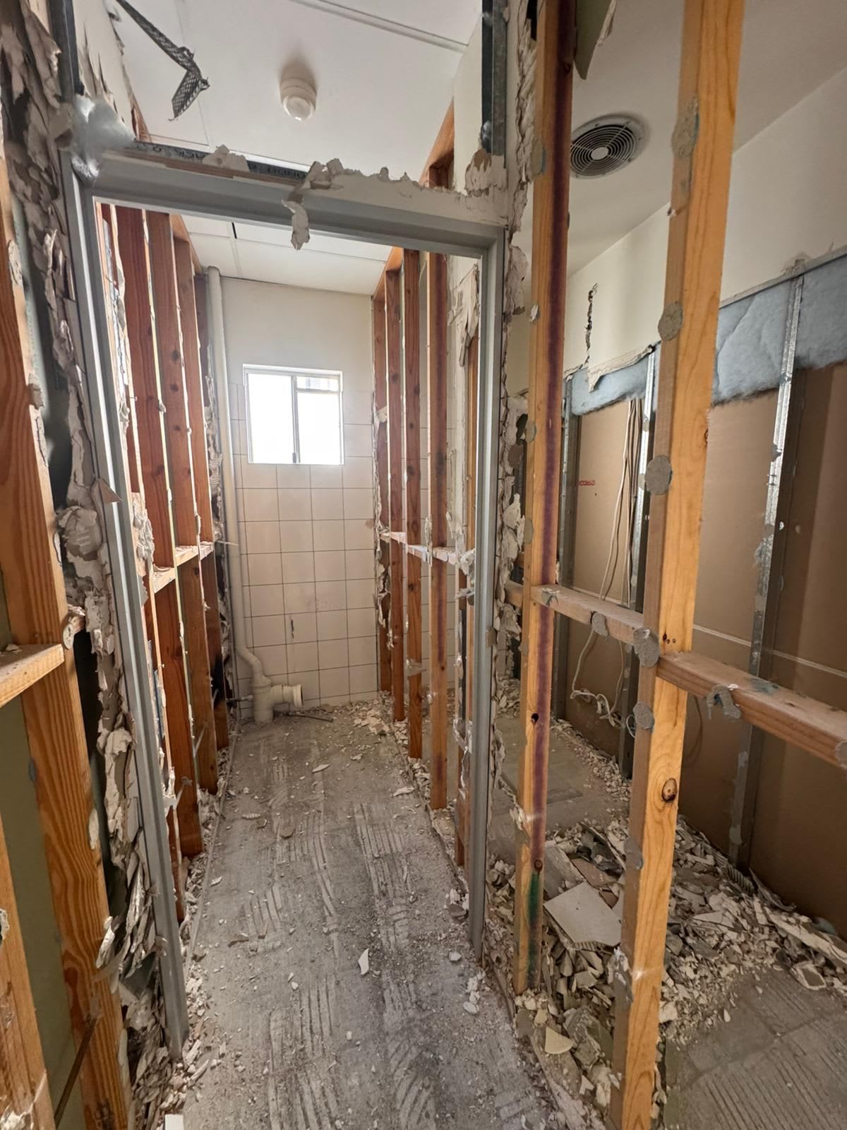 Narrow Bathroom Stripped To Framing