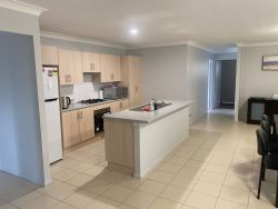 Interior shot of a kitchen and dining area