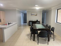 Interior shot of a kitchen and dining area