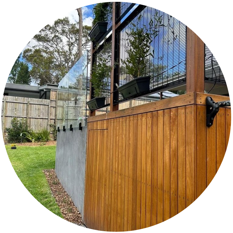 a picture of a wooden fence in a backyard