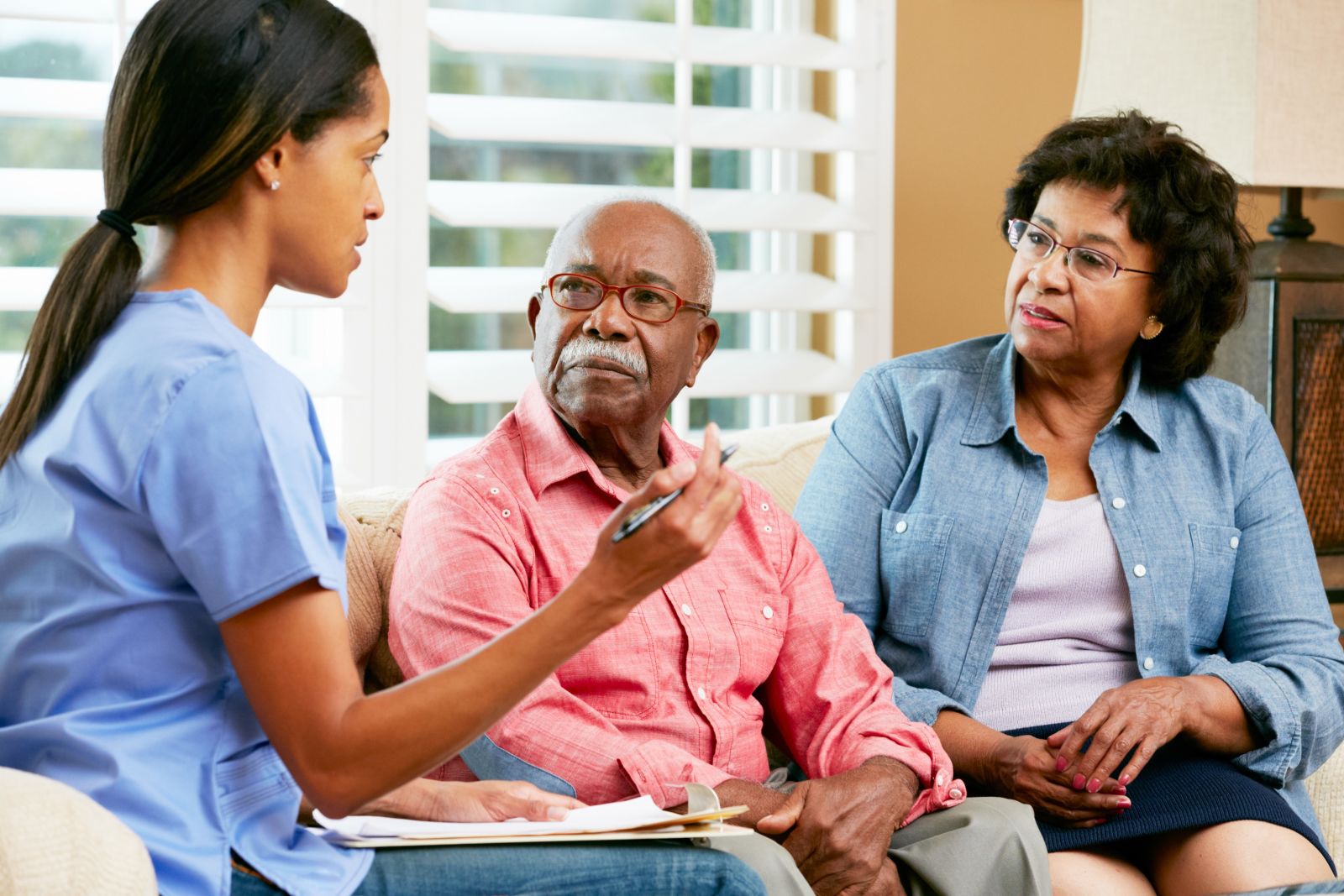 Nurse talking to clients