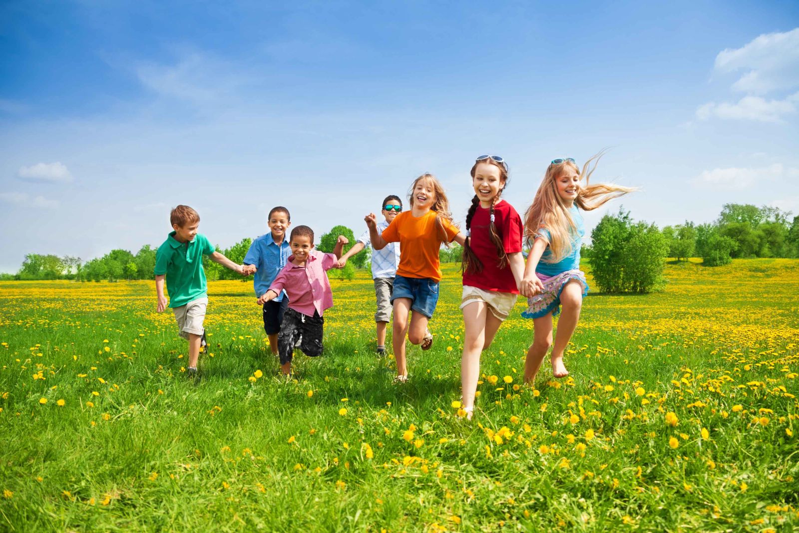 Children running in a field