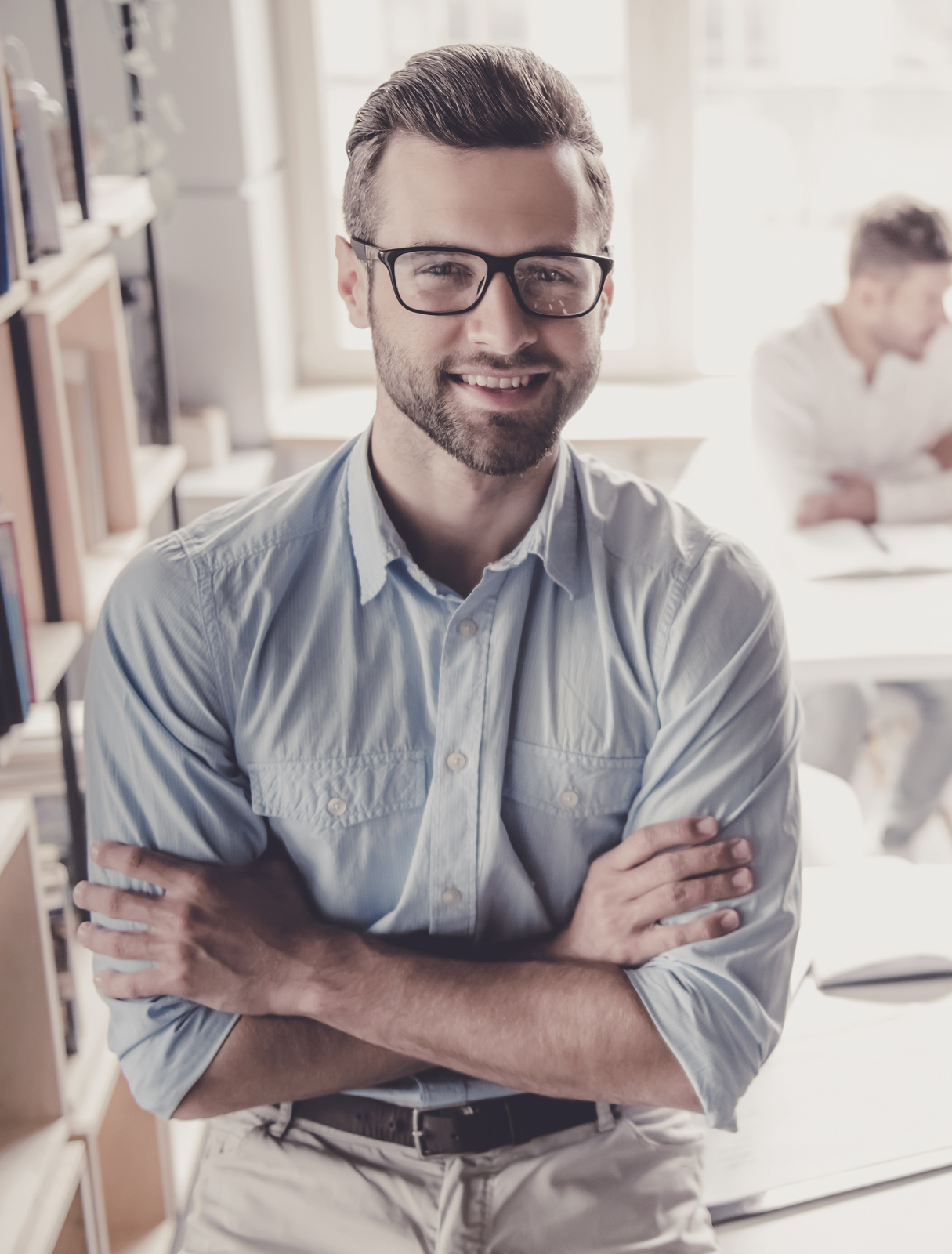 Casually dressed man with arms folded