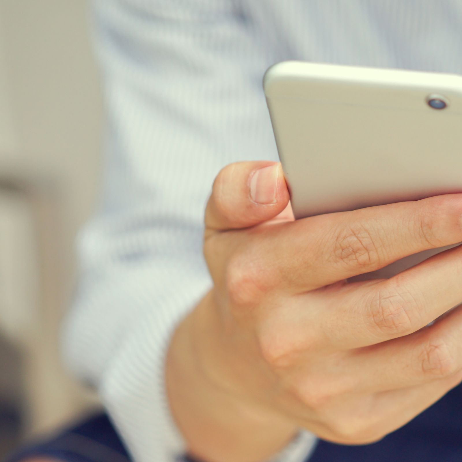 Person holding smartphone