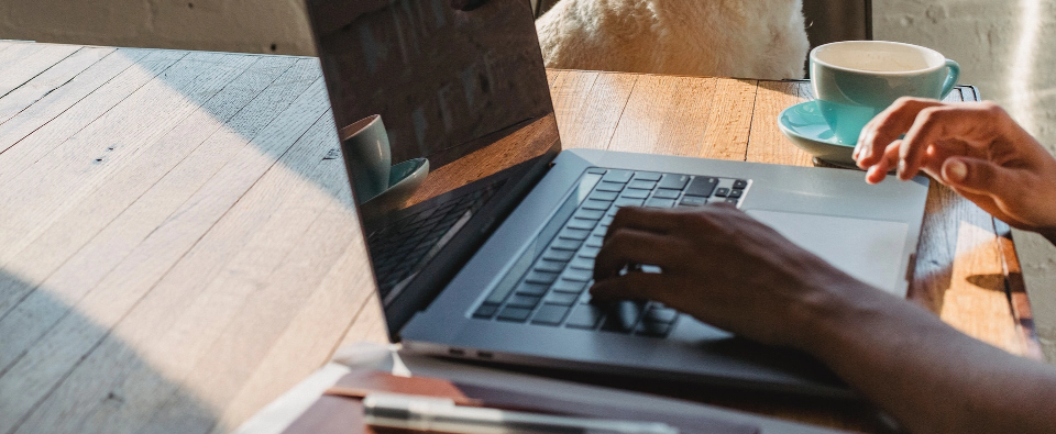 Laptop computer on wooden desk
