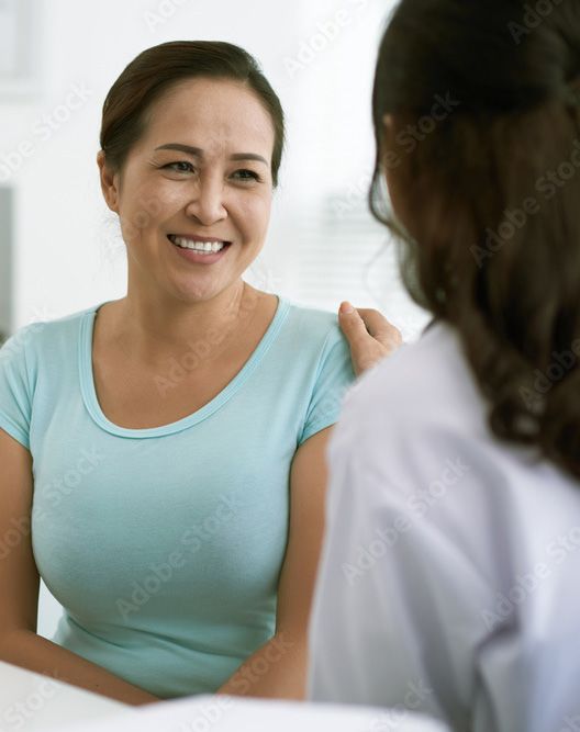 a patient talking to a doctor