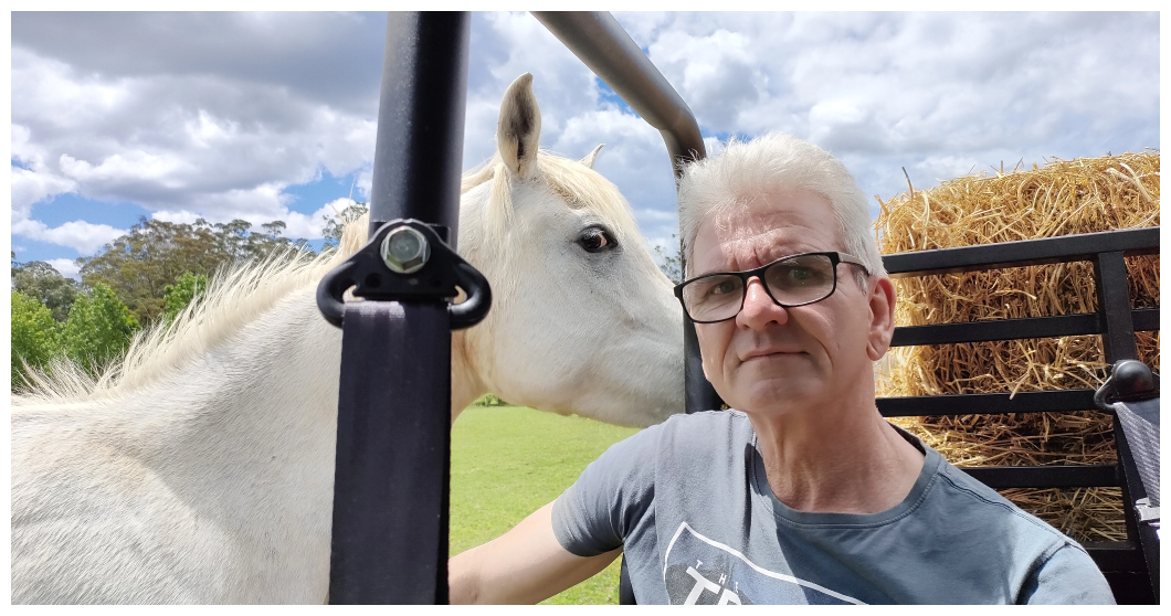 Man Standing with Horse