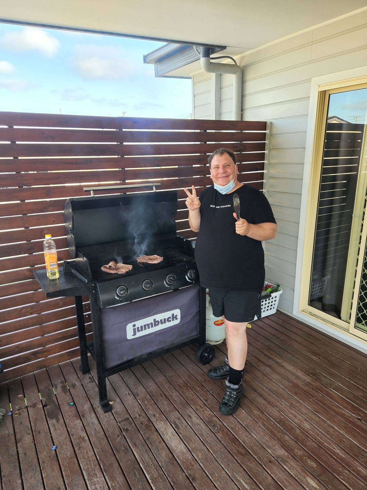 Man having a good time cooking on a barbeque